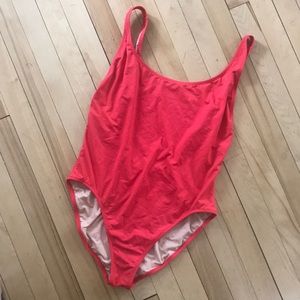 Red low neck, low back one piece swimsuit